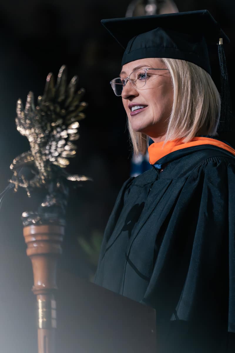 Woman at podium