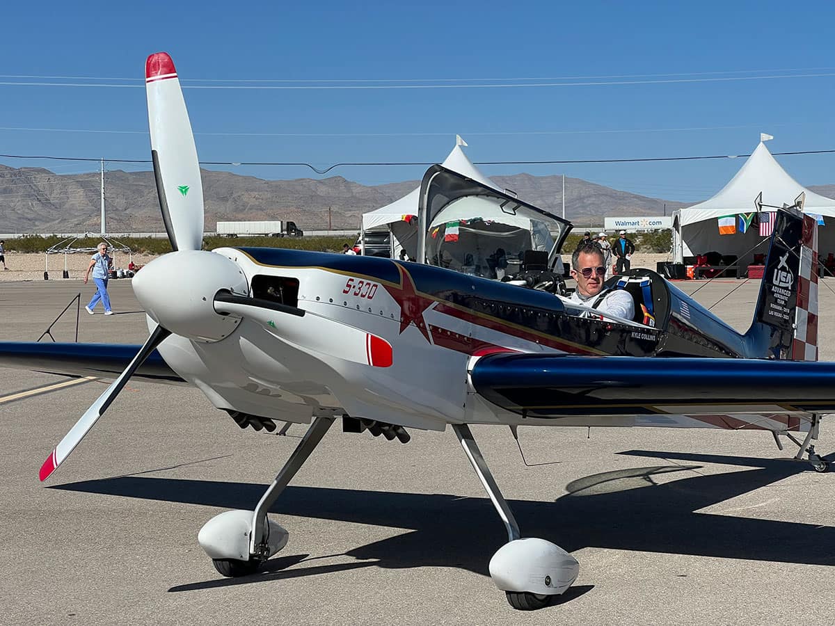 Embry-Riddle professor Kyle Collins prepares to fly his Panzl S-330 at the 2023 World Advanced Aerobatic Championships in Nevada 