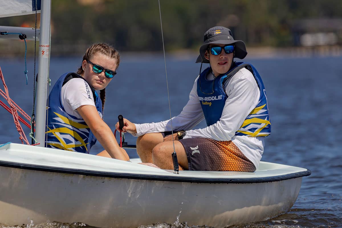 Embry-Riddle students Paige Arneson (left) and Zechariah Frantz compete as part of the university’s Sailing Club