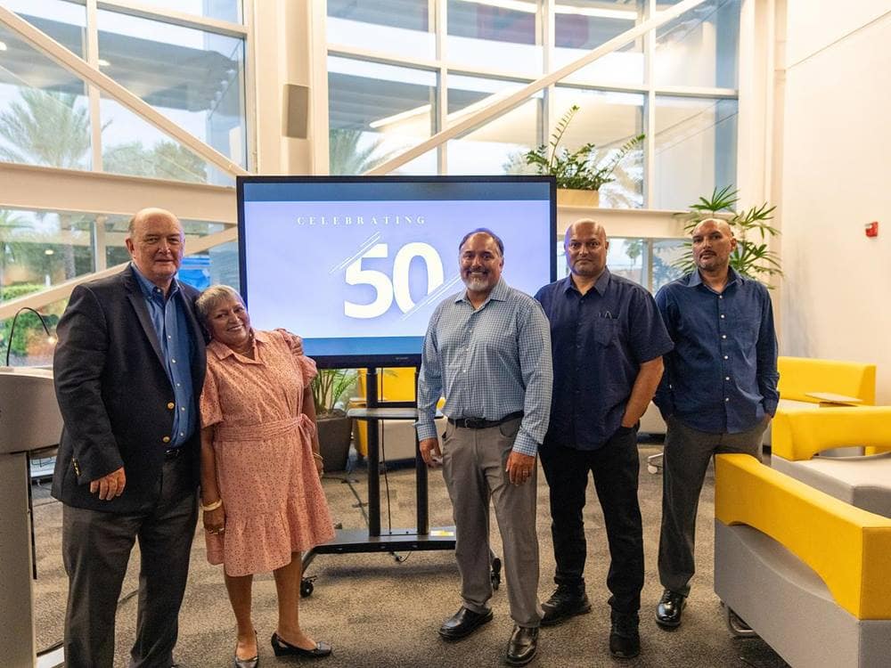 Embry-Riddle Professor Steven Hampton with his wife, Denise, and their three sons, Justin, Nicholas and Trevor