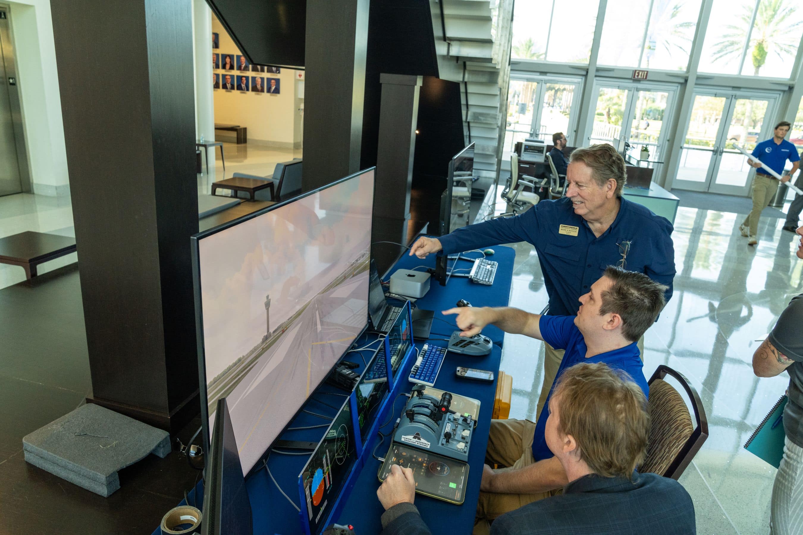  An Embry-Riddle AI Summit attendee checks out the Portable Cockpit Demonstrator, an AI-driven immersive system developed by the university’s Center for Aerospace Resilient Systems (CARS).