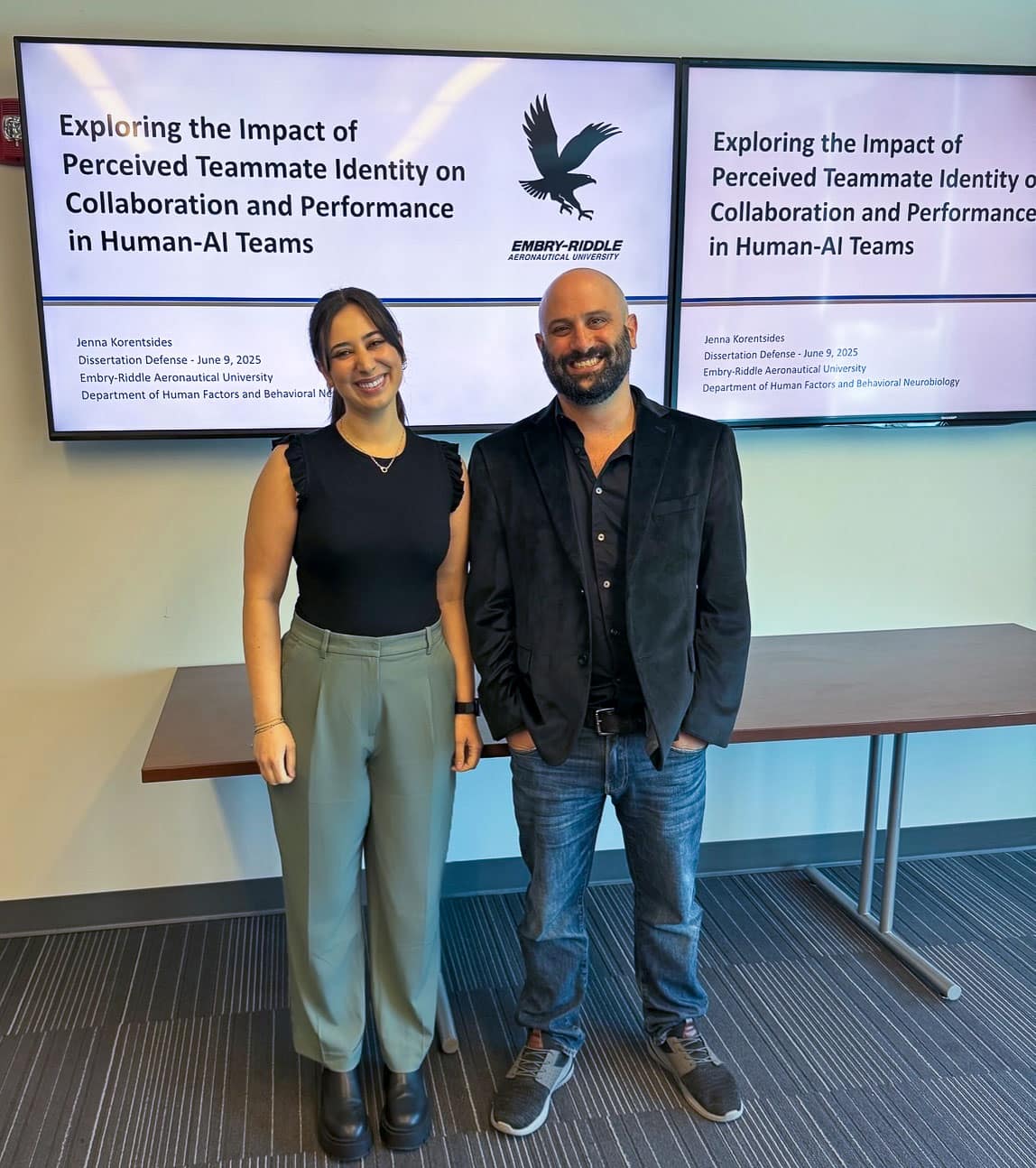 Korentsides at her dissertation defense, alongside her advisor Dr. Joseph R. Keebler, professor of Human Factors.