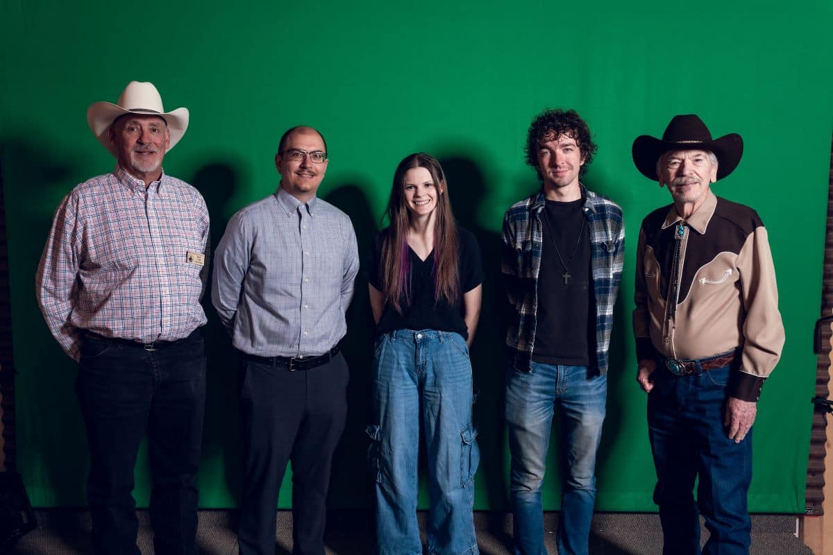 Description: Embry-Riddle Aeronautical University students collaborated with the Prescott Western Heritage Foundation to recreate scenes from Prescott’s Old West for the Western Heritage Center. From left: Doug Allen, Western Heritage Foundation project manager; Troy Barber, assistant director of annual giving programs at Embry-Riddle; students Kayleigh Hasselmeier and Ethan Hammonds, who are Simulation Science, Games and Animation majors; and Dennis Gallagher, founder and CEO of the Prescott Western Heritage Foundation, Inc.