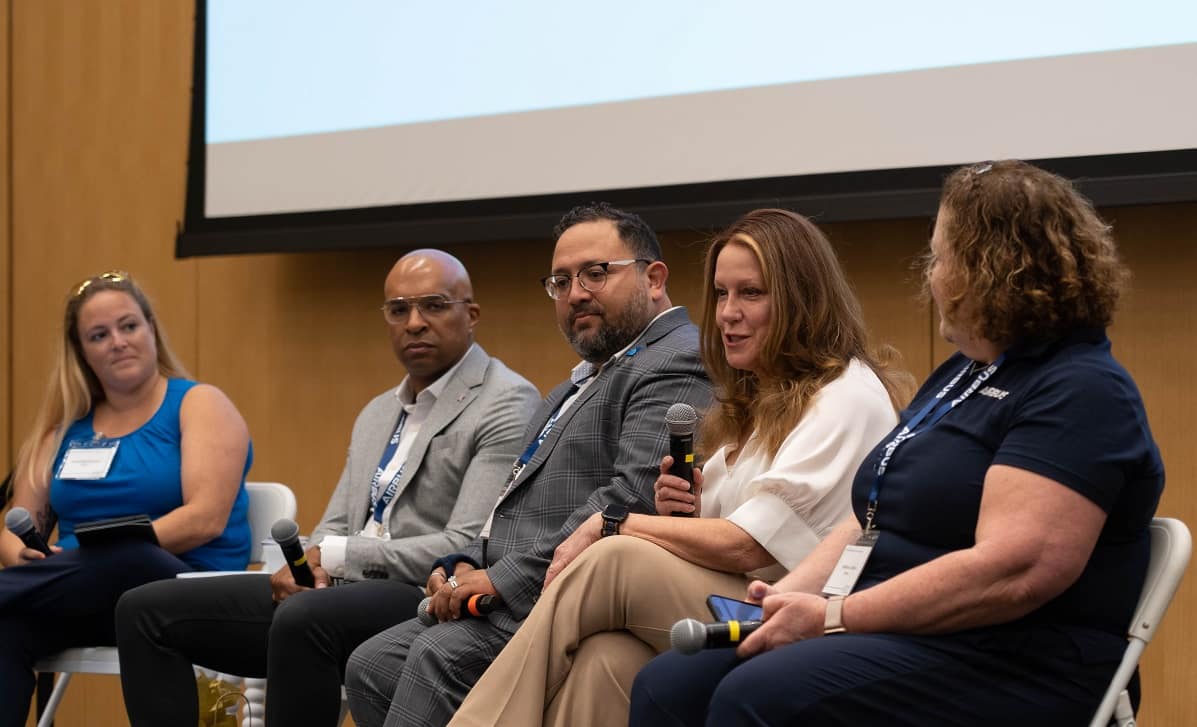 A Workplace Diversity, Equity and Inclusion Revolution panel discussion kicked off the National Training Aircraft Symposium 2022 at Embry-Riddle this week. From left to right, moderator Samantha Bowyer led a the discussion between Kevin Williams, of United Airlines; Efry Ayala-Johnson, of United Airlines, Stephanie Kenyon, of Women in Aviation; and Andrea Leehan, of Airbus. (Photo: Embry-Riddle/Jack Wernet)