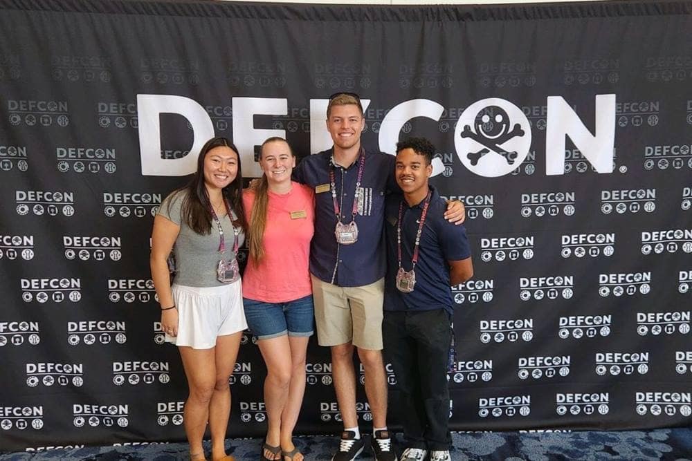 Air Traffic Management senior Jennifer Hong (left) with fellow students Carol Martin, Joshua Sawyer and Christian Hardy at the DEF CON cybersecurity conference