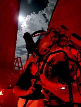 Erin Abraham looking through Embry-Riddle's one-meter telescope