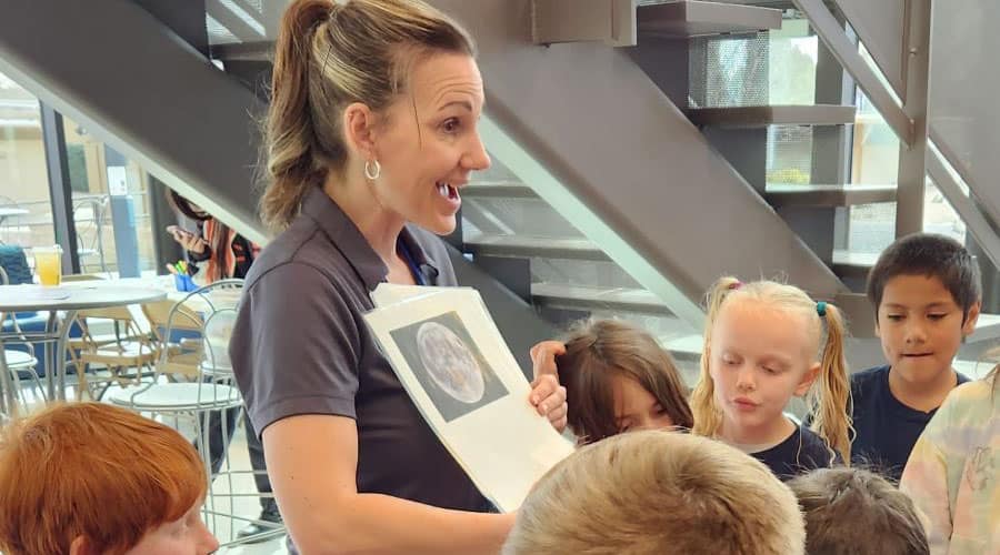 Embry-Riddle STEM Outreach Director Tabitha King gives students from Acorn Montessori School a lesson about the Earth’s moon