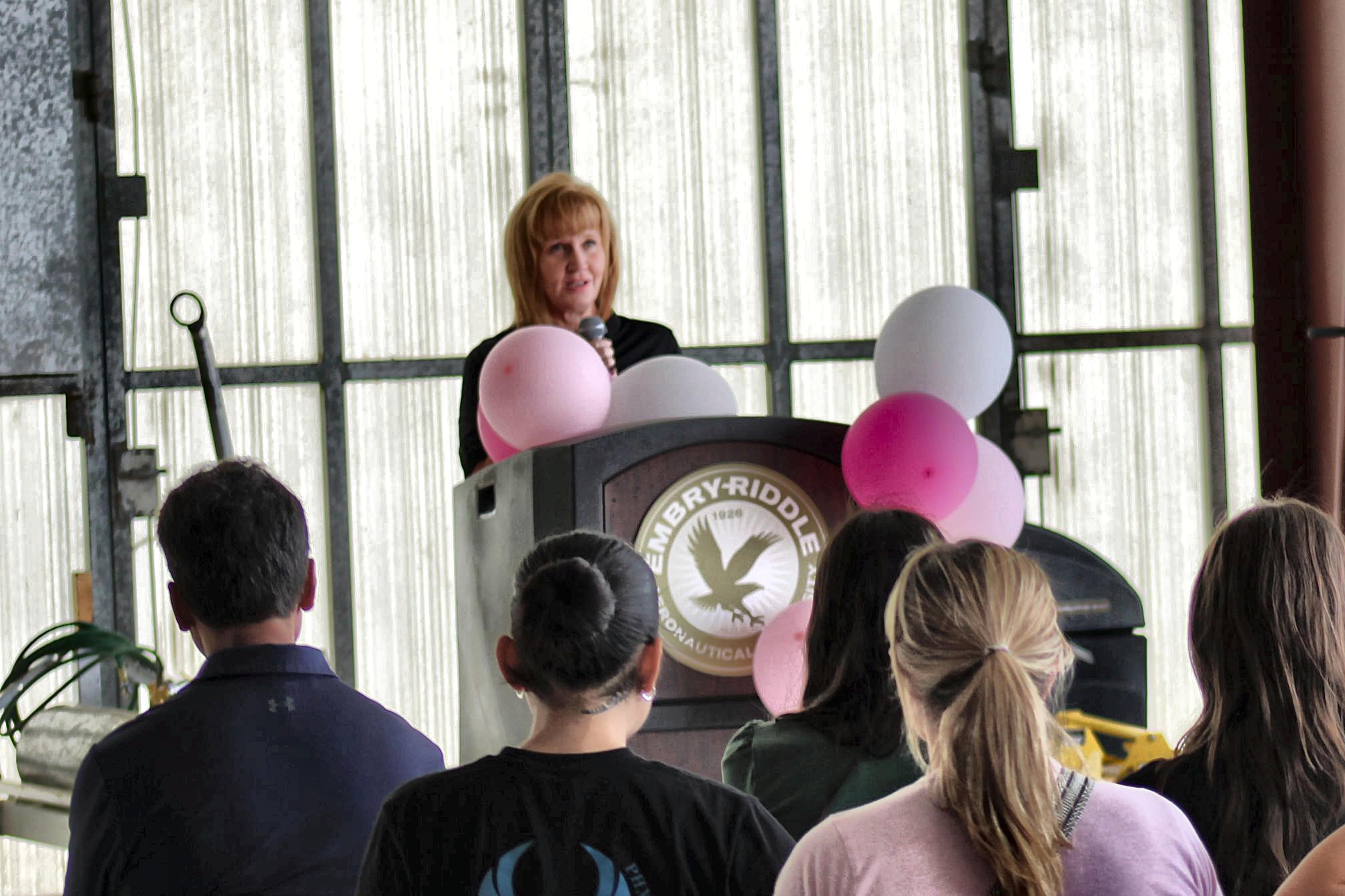 Kim Ernzen, chief operating officer of StandardAero, delivers the keynote address during Girls in Aviation Day at Embry-Riddle’s Prescott Campus.
