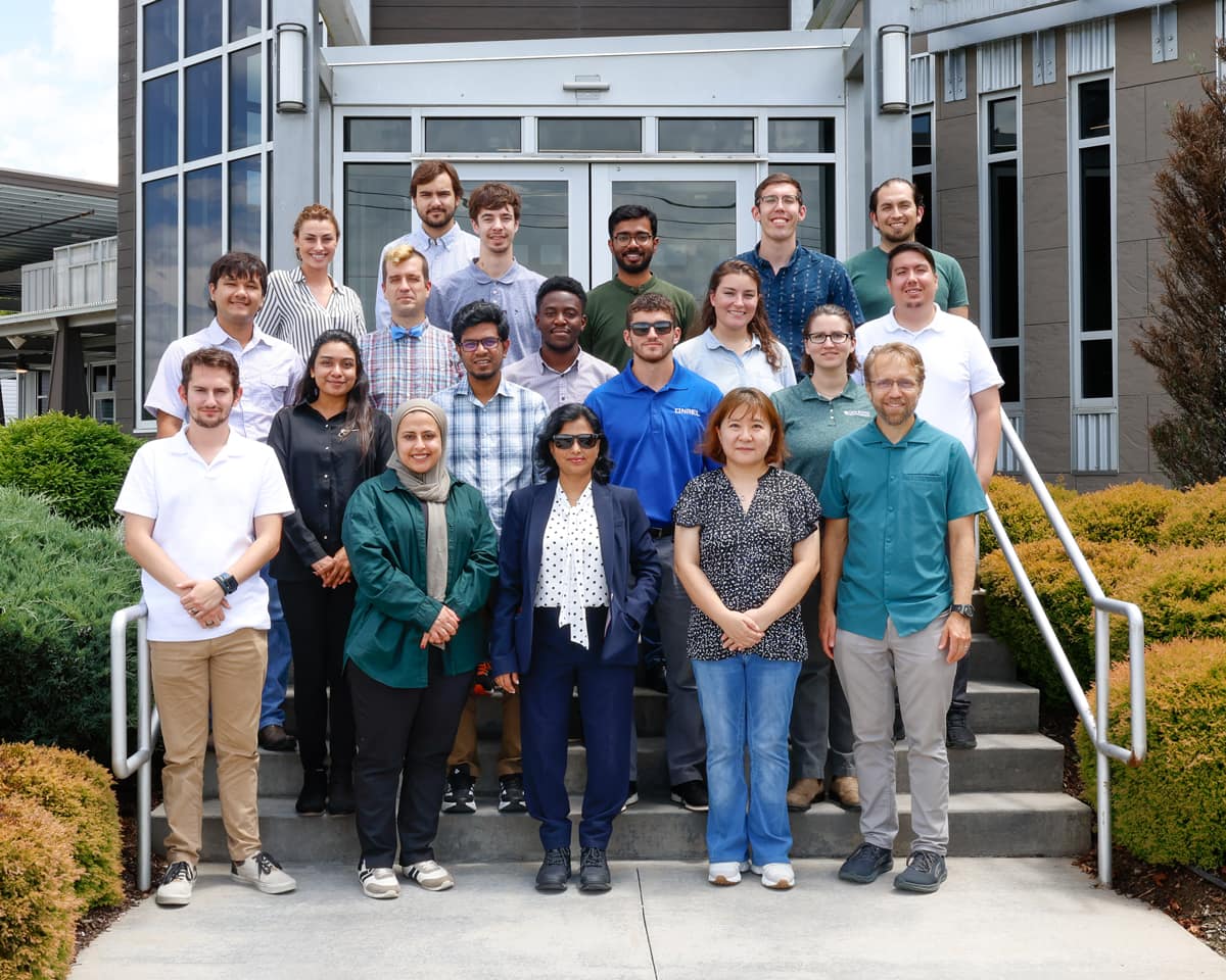 Five Embry-Riddle Mechanical Engineering students were chosen for nationally competitive internships conducting research at world-class U.S. Department of Energy laboratories. Here, internship recipients Olivia Wilson, Diego Prado (far right in the second and third rows, respectively) and Jacob Owen (in the blue NREL shirt with sunglasses) are pictured during a visit to Oak Ridge National Laboratory.