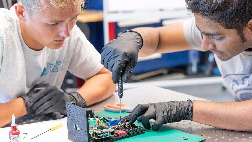 Students work on some electronics