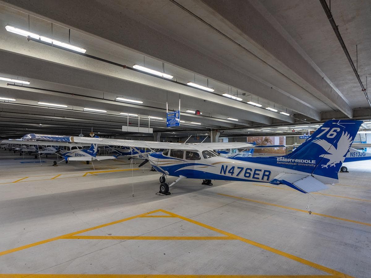 To avoid storm damage, a fleet of Embry-Riddle aircraft are stored securely in a Daytona Beach Campus parking garage