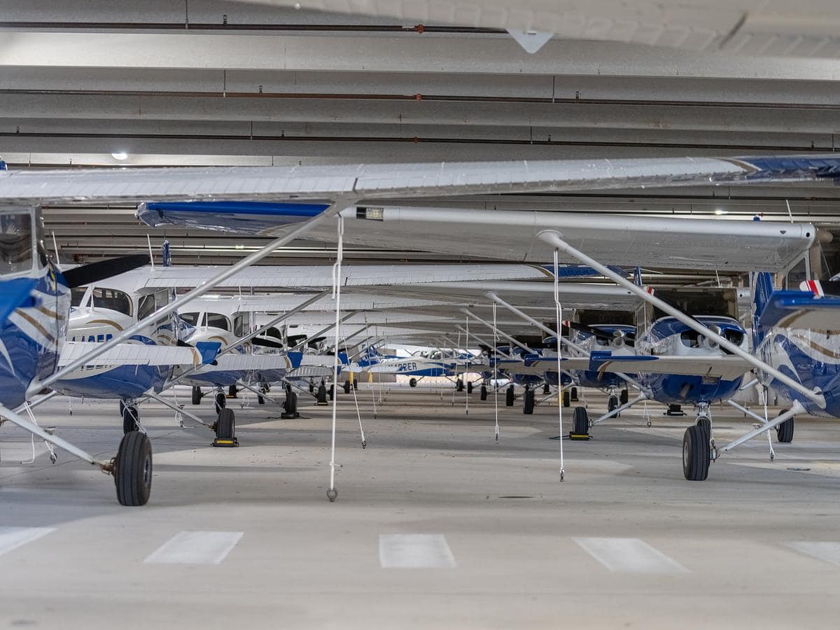 To avoid storm damage, a fleet of Embry-Riddle aircraft are stored securely in a Daytona Beach Campus parking garage