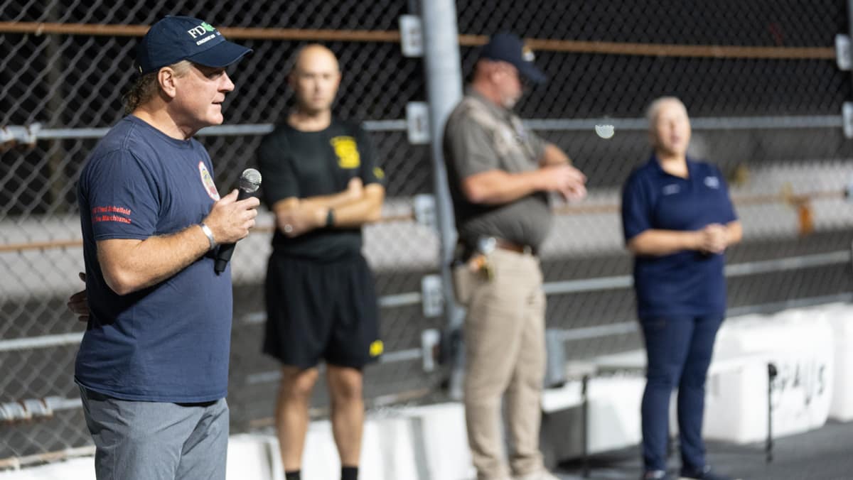Frank Morrisey, who served as an FDNY firefighter on Sept. 11, addresses cadets and midshipmen before they begin their climb.