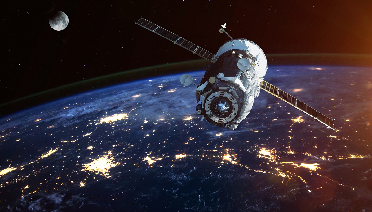 Spacecraft Launch Into Space. Elements of this image furnished by NASA. International Space Station flying over Earth