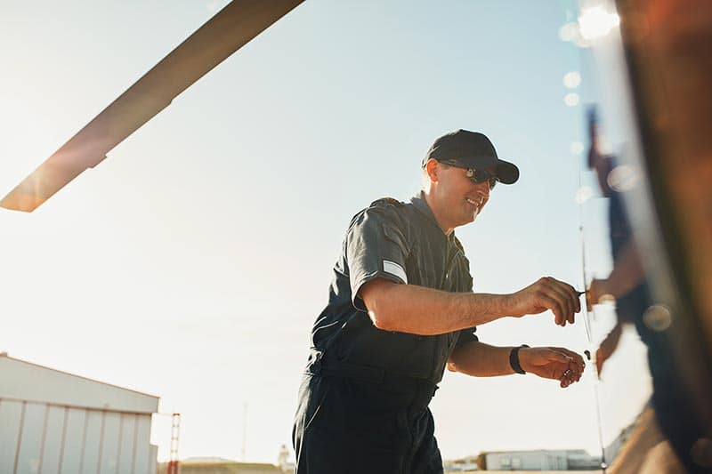 Man inspects aircraft