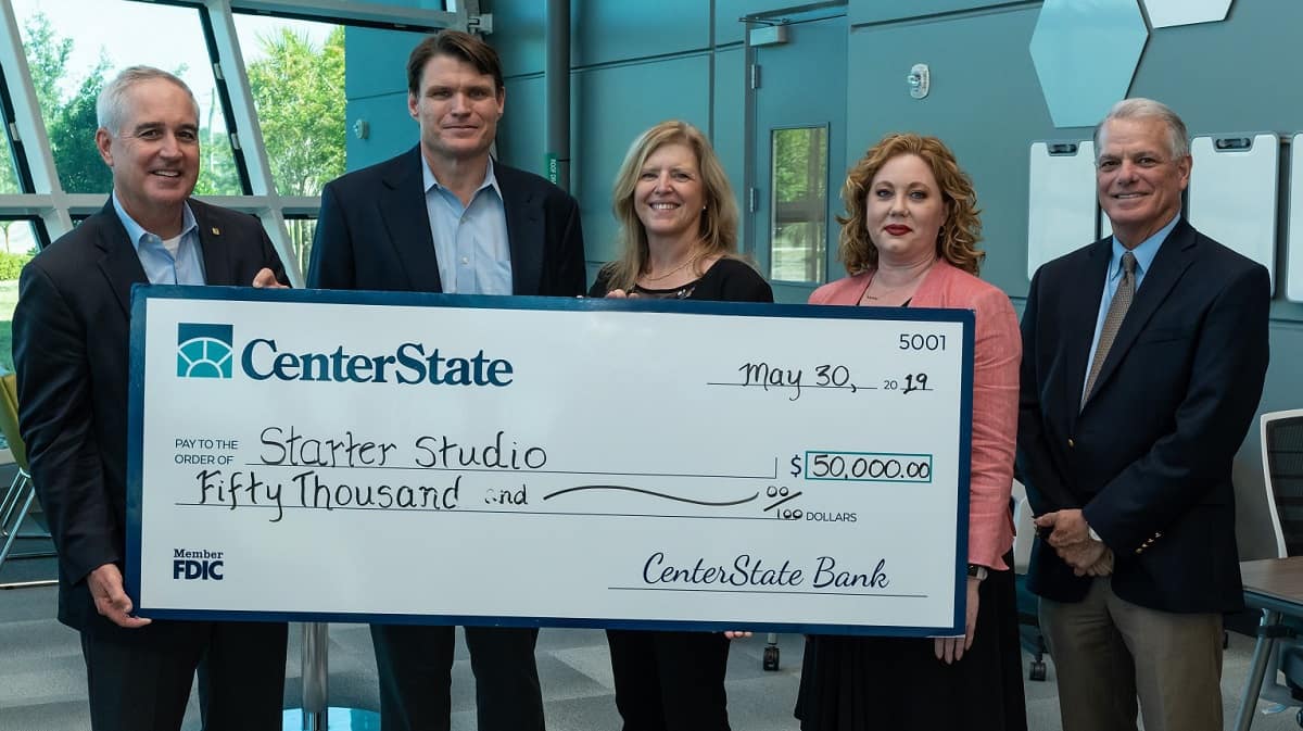CenterStateBank officials present a check to StarterStudio to support startup businesses in central Florida. Left to right: Mike Sleaford, CenterStateBank Regional President; Embry-Riddle Senior Vice President for Administration and Planning Rodney Cruise; Executive Director Donna Mackenzie; Mellissa Slover-Athey, FVP, CRA Officer CenterStateBank; Phil Zeman, Senior Vice President, CenterStateBank. (Photo: Embry-Riddle/Daryl Labello)