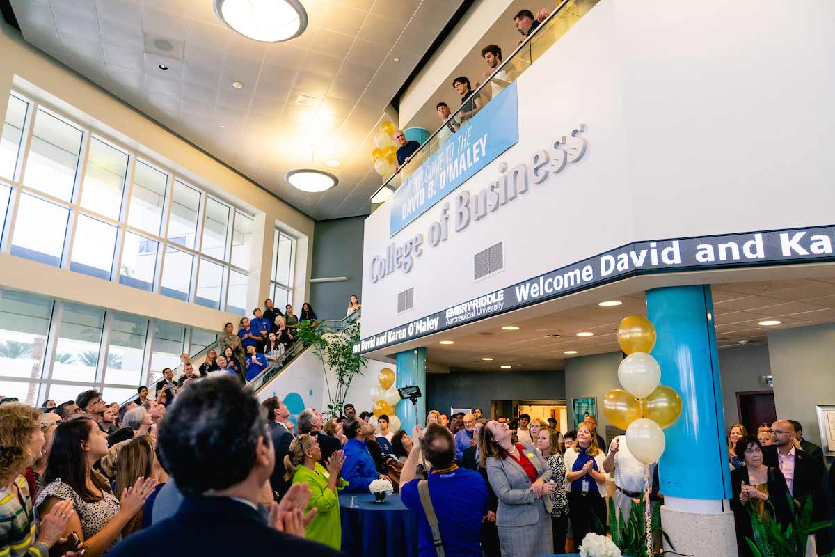 Students, faculty, and staff gather for the David B. O'Maley College of Business dedication.