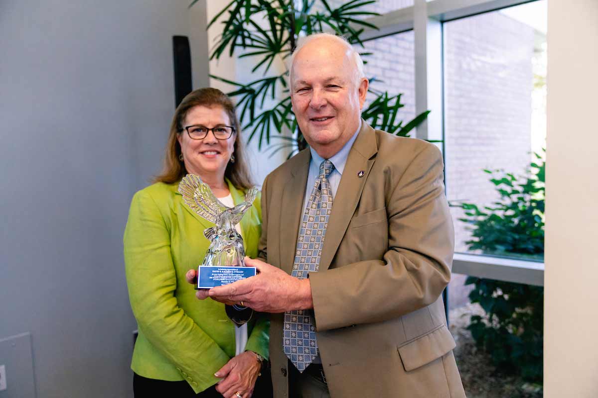 David B. Omaley and his wife karen pose with a Crystal Eagle award.