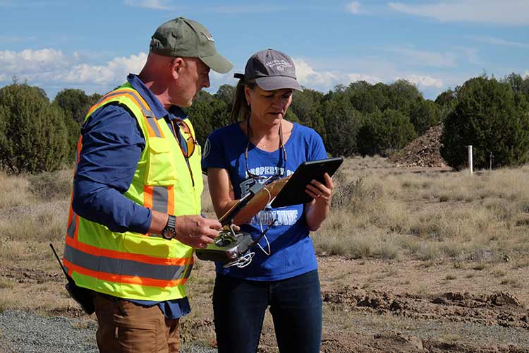 Embry-Riddle professors Kristy Kiernan and Scott Burgess testing unmanned aircraft systems (UAS) equipment and procedures.
