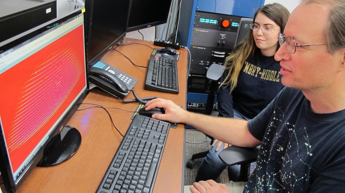 Dr. Jason Aufdenberg, associate professor of Physics and Astronomy and undergraduate program coordinator for Astronomy and Astrophysics, along with junior Allison Acosta, look at spectral lines of the star system Sirius, the brightest star in Earth's night sky.