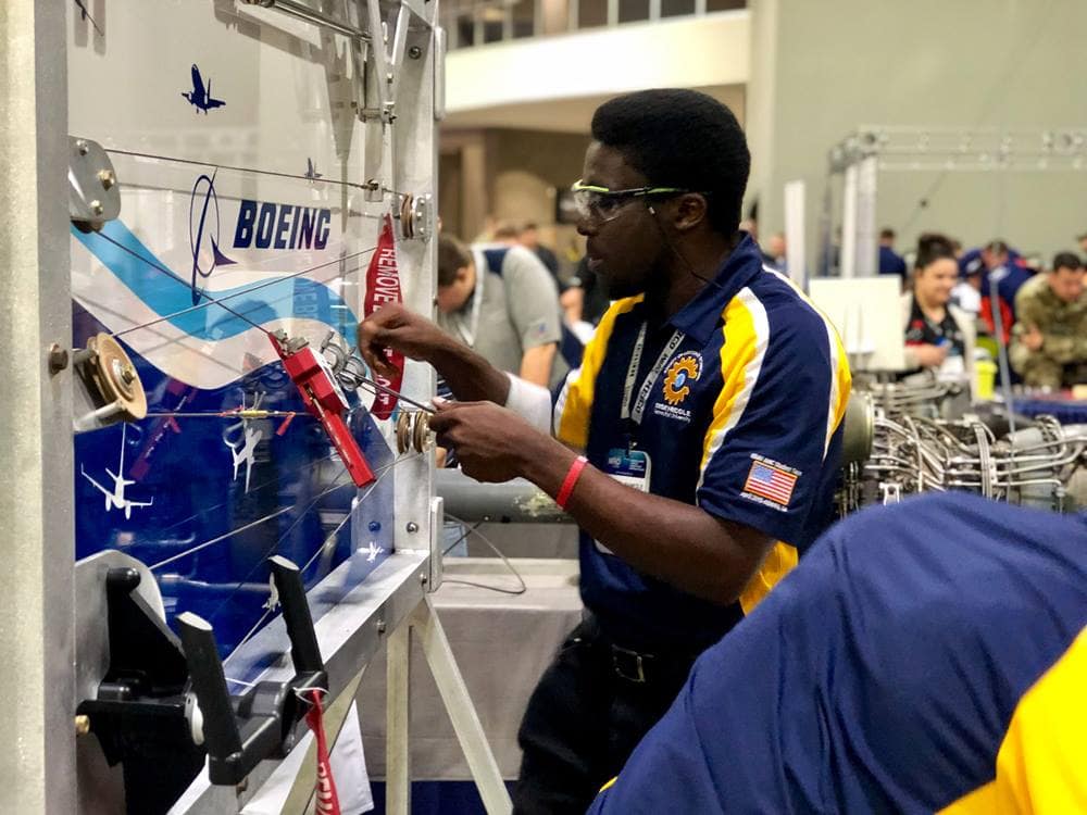 In addition to the team’s first place win in the schools category, two students won individual awards: Immanuel Bankole secured a PAMA / PistonPower scholarship. Ben Henriquez (not shown) earned a Professionalism Award.