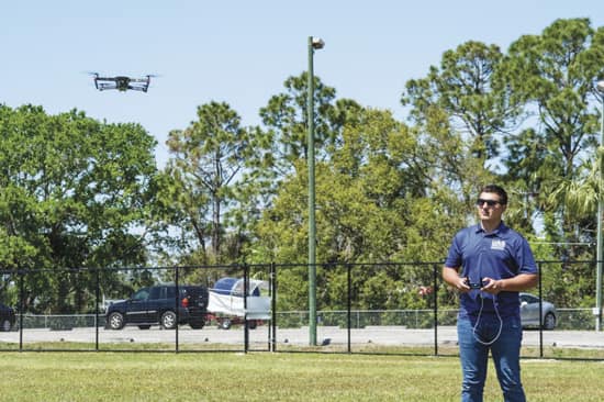 Hunter Tedrick flies a drone.
