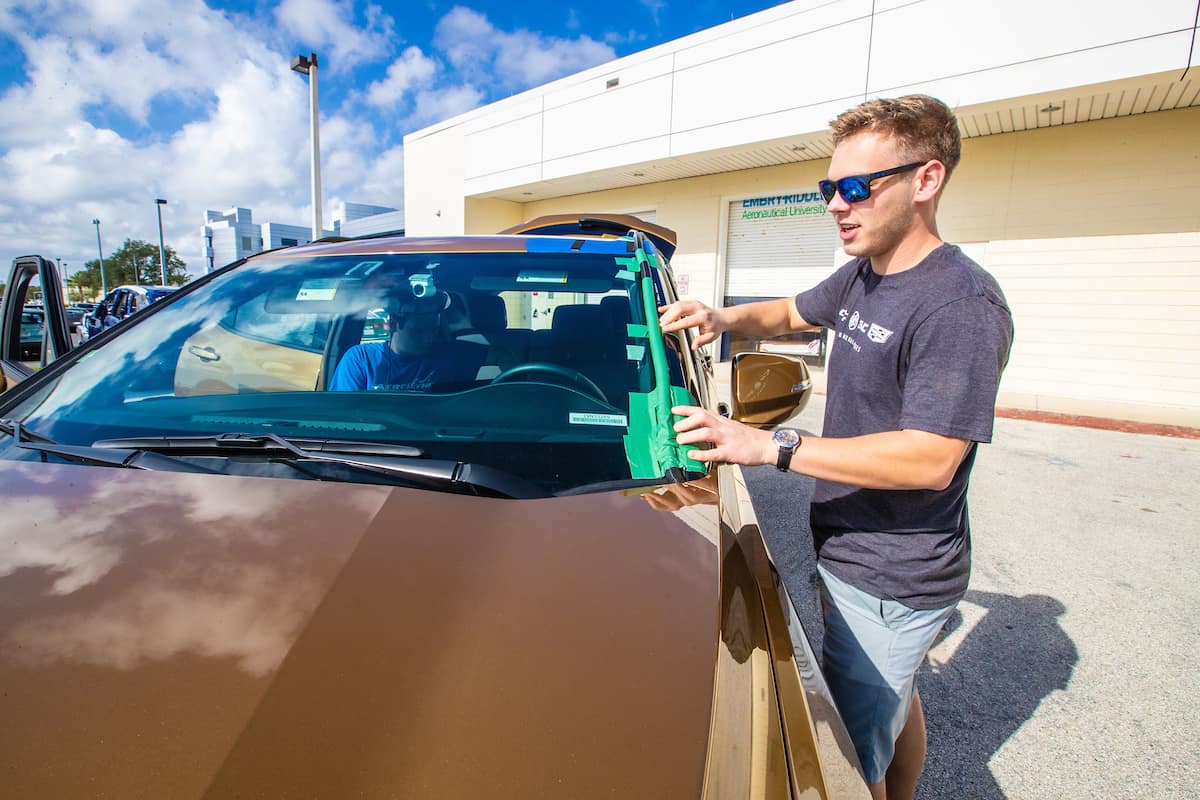 Student outside of the EcoCar