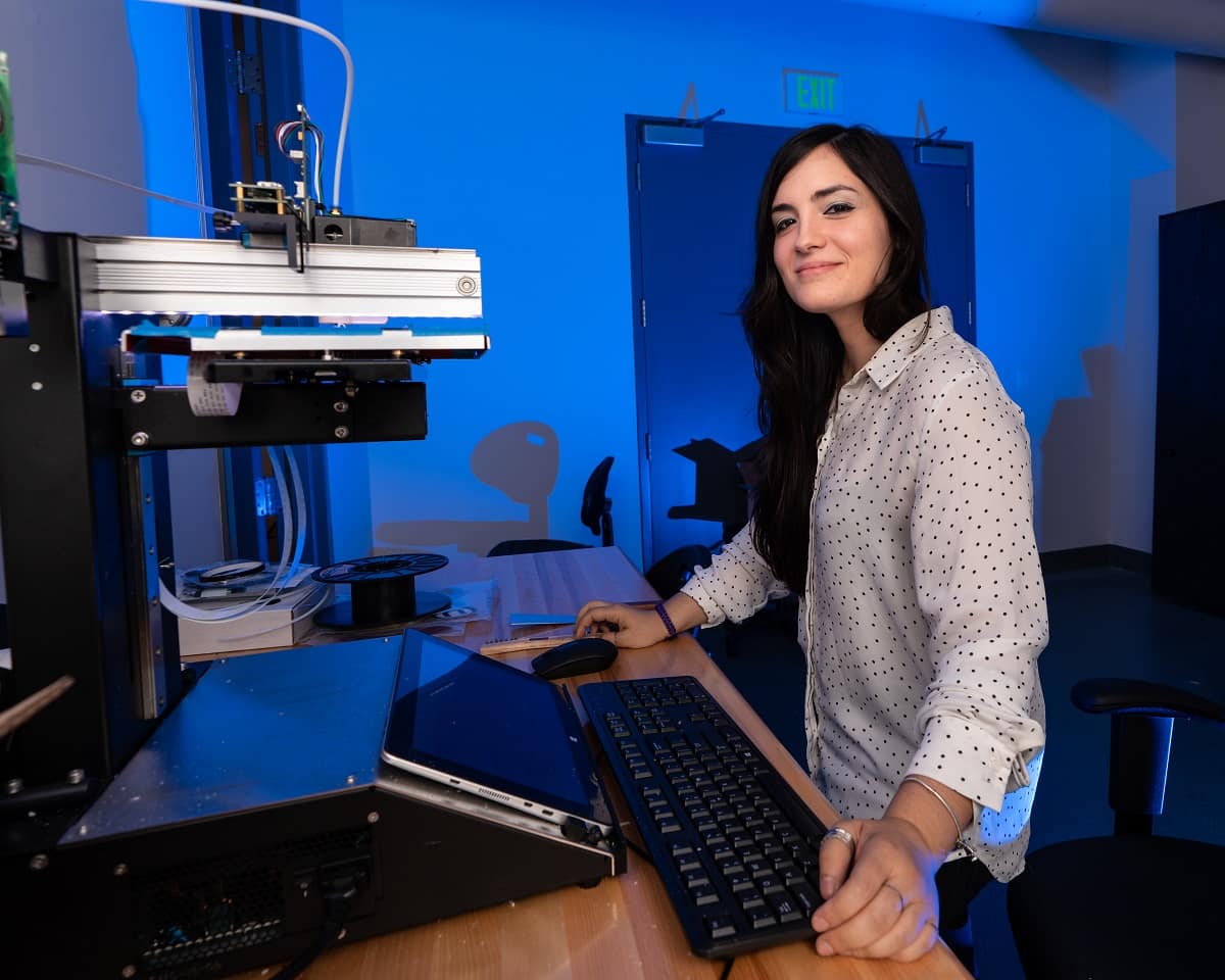 Embry-Riddle graduate student Noemi Miguelez works in the parts manufacturing section of the Wireless Devices and Electromagnetics (WiDE) Laboratory in the MicaPlex
