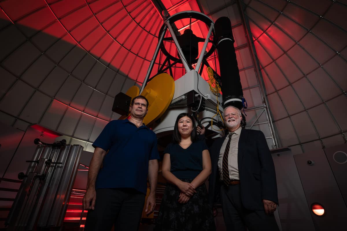 Shown with Embry-Riddle’s one-meter research-grade telescope are star investigators (L-R): Dr. Derek Buzasi, the Whitaker Eminent Scholar in Science at Florida Gulf Coast University, Dr. Tomomi Otani, assistant professor of Physics and Astronomy at Embry-Riddle, and Dr. Terry Oswalt, professor of Engineering Physics and chair of Embry-Riddle’s Physical Sciences Department. (Photo: Embry-Riddle/Daryl LaBello)