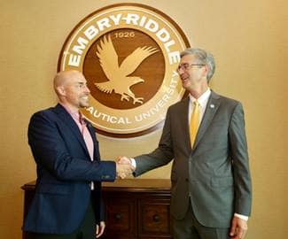 Embry-Riddle President P. Barry Butler and Aventine Development Corporation CEO Chad Hagle celebrate the launch of the Space Square aerospace hub.