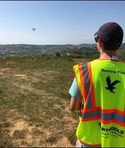 Jonathan Hale flies a drone in Kosovo 