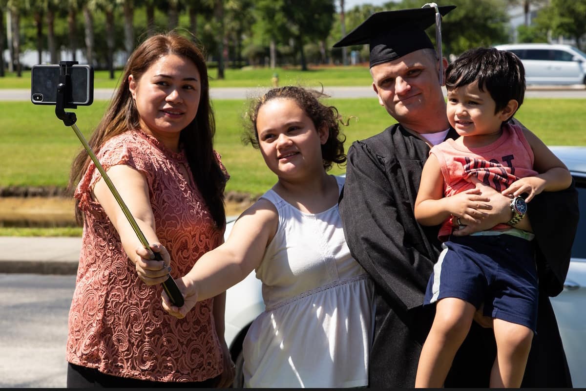 Worldwide graduate with family