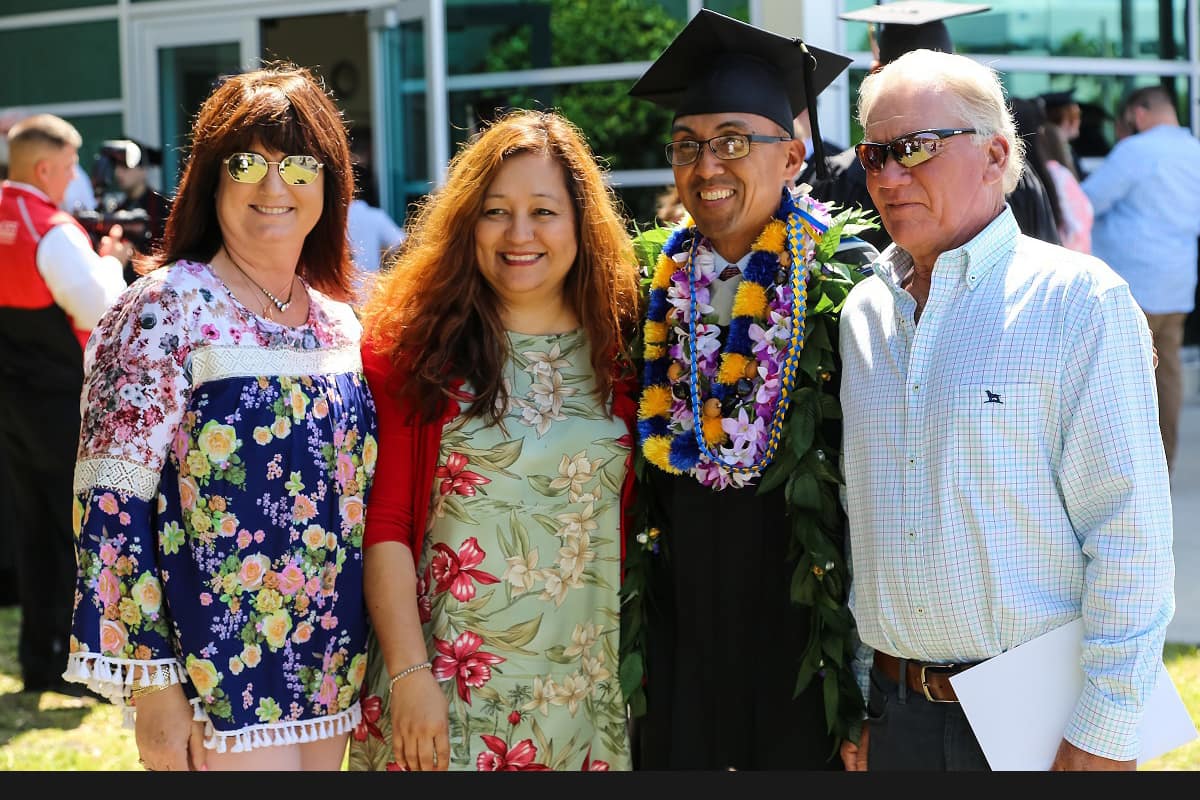 Worldwide graduate with family.