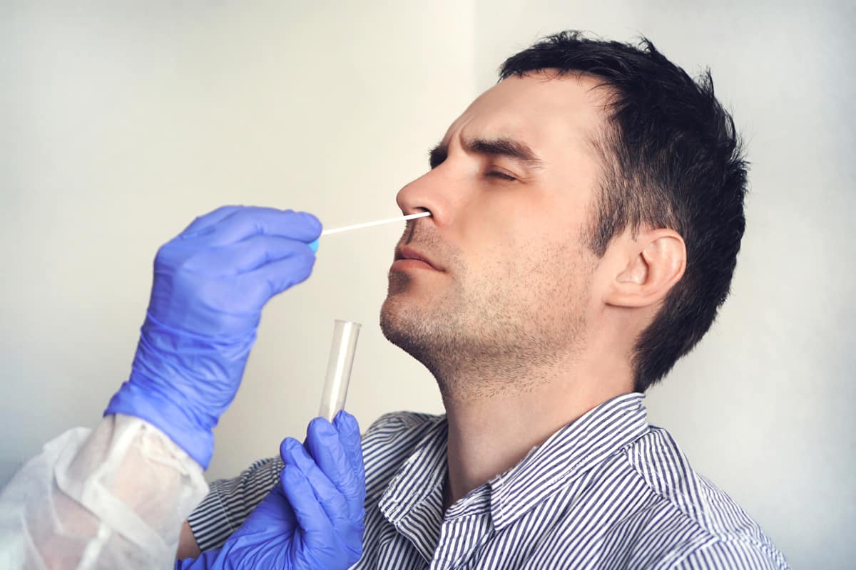 Man getting Coronavirus nasal swab.