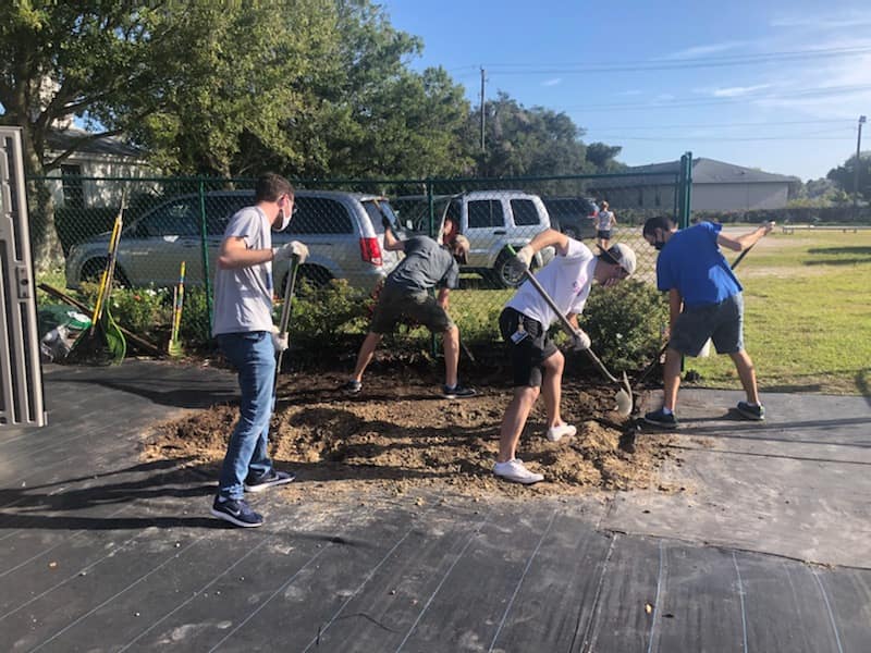 Students in Embry-Riddle’s Honors Program volunteer their time at Daytona Beach nonprofit Derbyshire Place, cultivating crops to feed the local community.