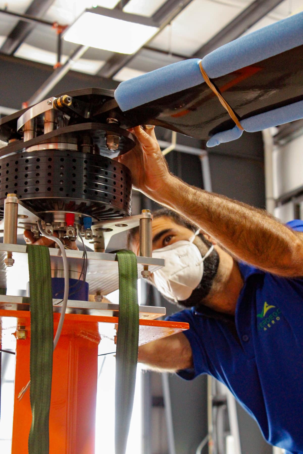 Senior Aeronautical Engineer Xavier Santacruz assembles VerdeGo Aero's Rotor Test Stand.