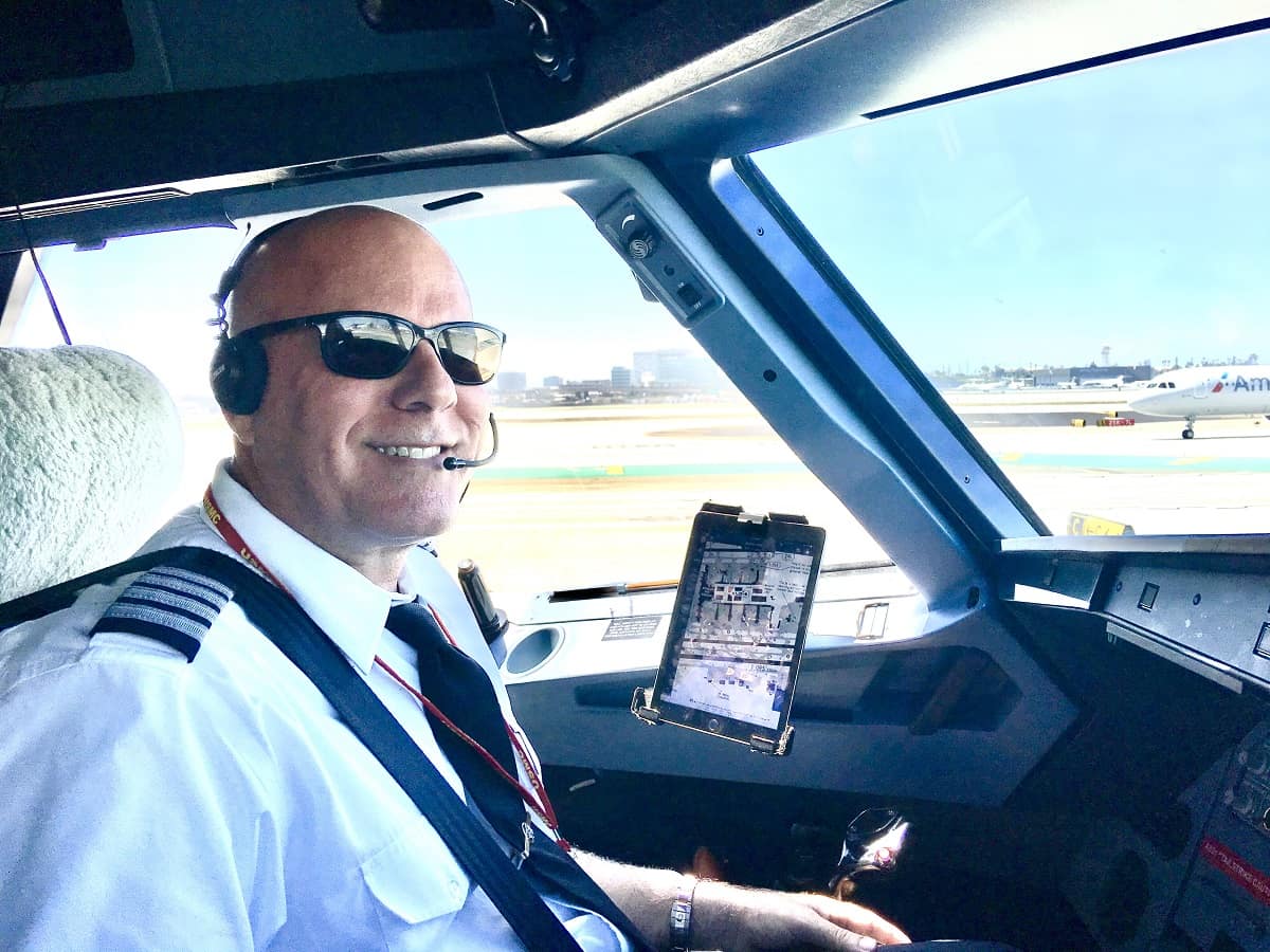 Edwin Odisho in an airplane cockpit