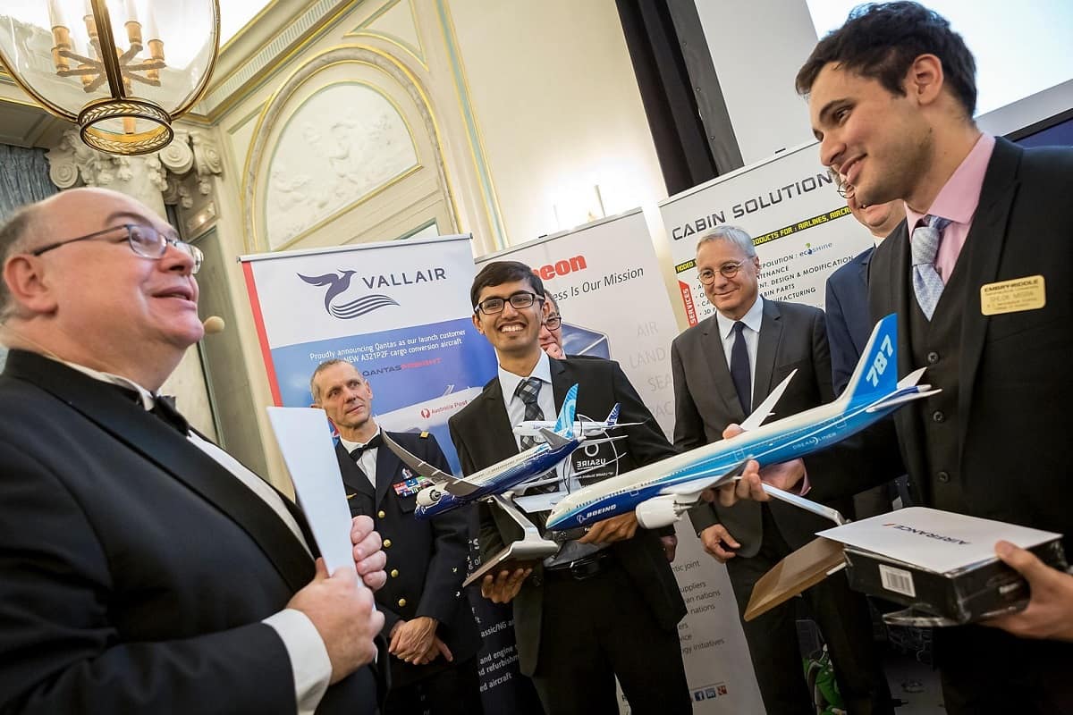 University of California San Diego student Tanish Jain and Embry-Riddle Aeronuatical University student Shlok MIsra speak with USAIRE officials at the 14th-annual awards ceremony. 
