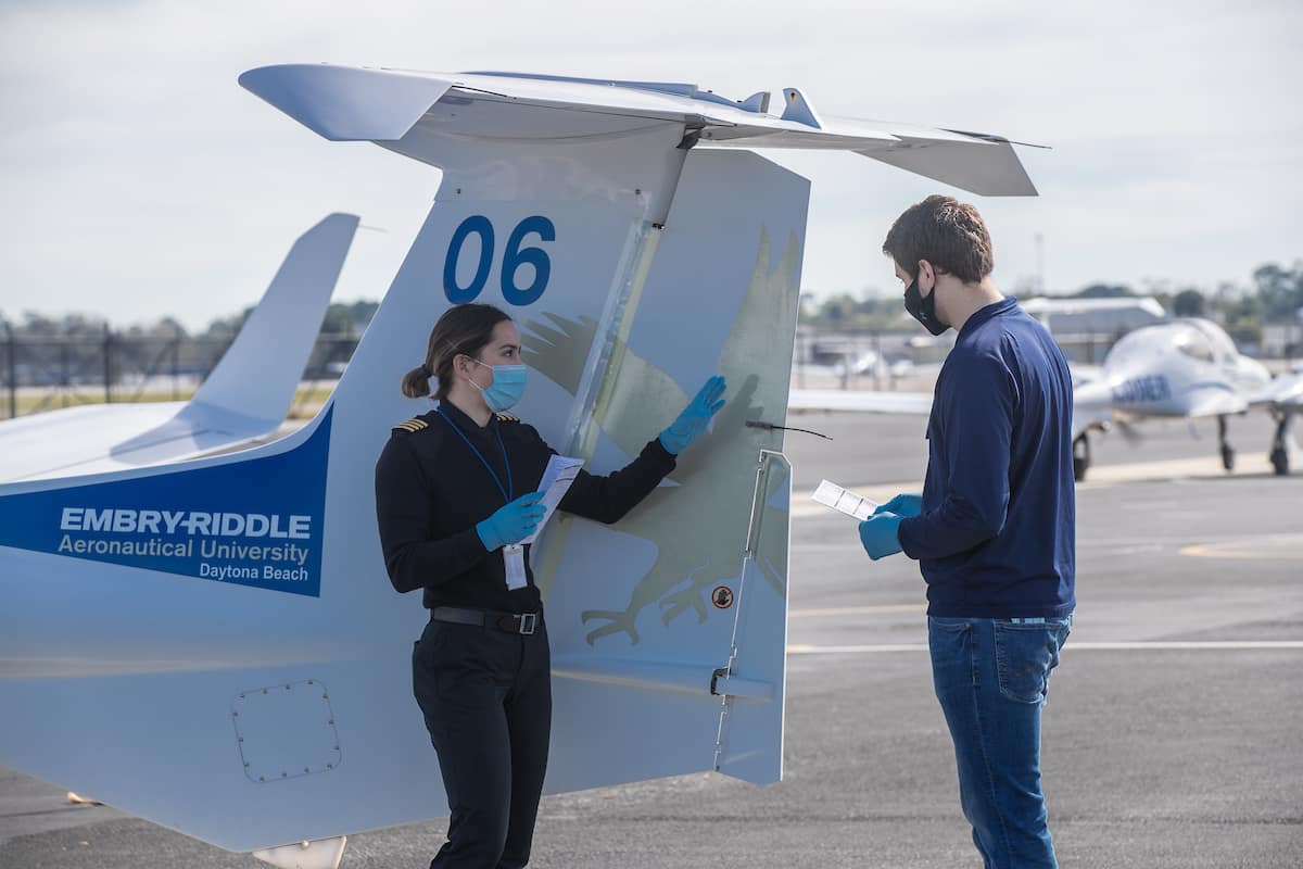 Flight Instructor Anna Battison performs a pre-flight check with student pilot Dawson Schriner at Embry-Riddle Aeronautical University’s Daytona Beach Campus Flight Line.