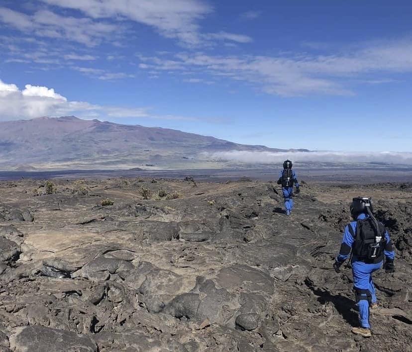 Embry-Riddle students Lea Miller and Niko Blanks walk the terrain of the Hawaii Space Exploration Analog Simulation (HI-SEAS) habitat, experiencing what it would be like to live on Mars during a research mission. 