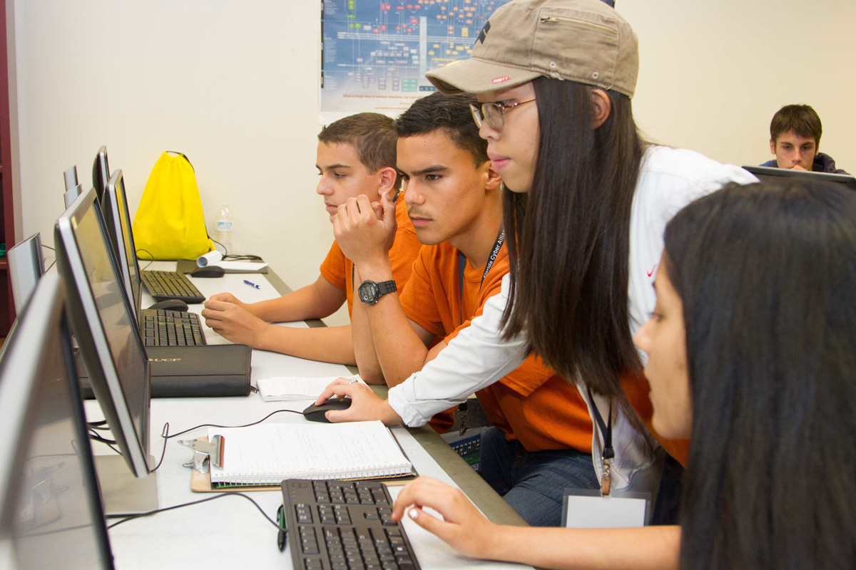 Young students worked on a problem at a cyber camp sponsored by the National Science Foundation (NSF) and run by Dr. Philip Craiger, a professor in Embry-Riddle’s Department of Security Studies and International Affairs, and colleagues.