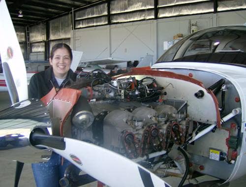 Assistant Professor of Aviation Maintenance Science Derren Kuhn works on an aircraft in Embry-Riddle’s AMS hangar. (Photo: Derren Kuhn) 