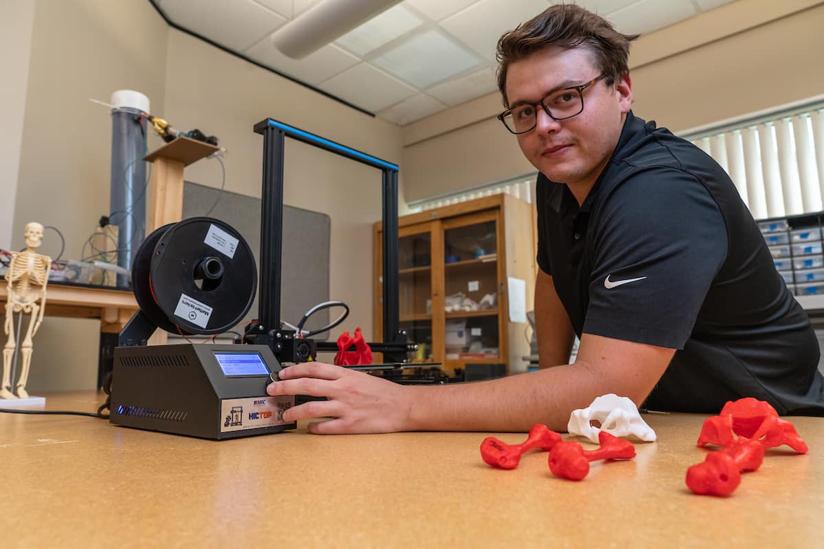 Mechanical Engineering master’s student Quinn Guzman is assisting in the 3D fabrication of femurs and hip models of various densities to create an infant model that will help doctors become more familiar with hip dysplasia. (Photos: Embry-Riddle/Daryl LaBello)