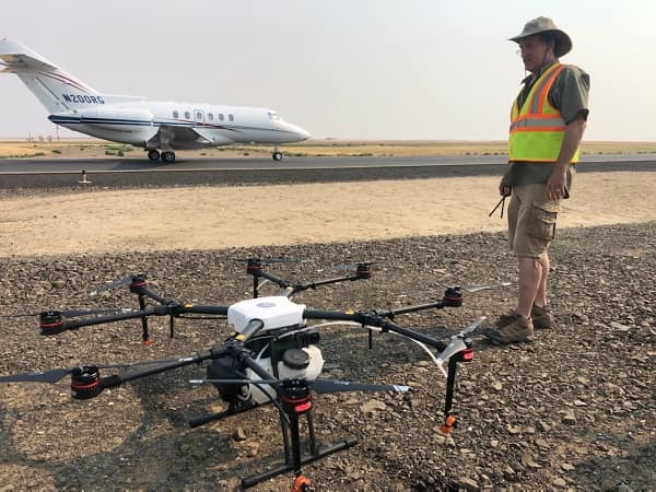 Dr. David Thirtyacre prepares to conduct UAS flight operations.