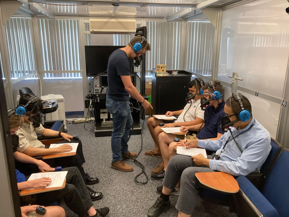 Erik Larsen, a senior in Embry-Riddle’s College of Arts and Sciences, leads a session inside the HAL chamber. After graduation, Larsen will attend medical school.