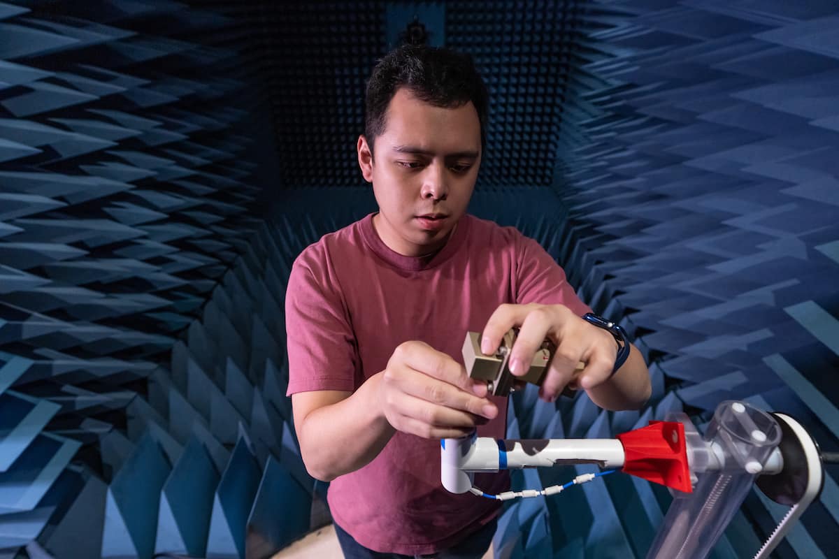 Hanson Yu, a Ph.D. candidate in the Electrical Engineering and Computer Science program, tests the signal properties of a device in Embry-Riddle’s anachoic chamber, housed inside the John Mica Engineering and Aerospace Innovation Complex (MicaPlex), in the Research Park. (Embry-Riddle/Daryl LaBello)