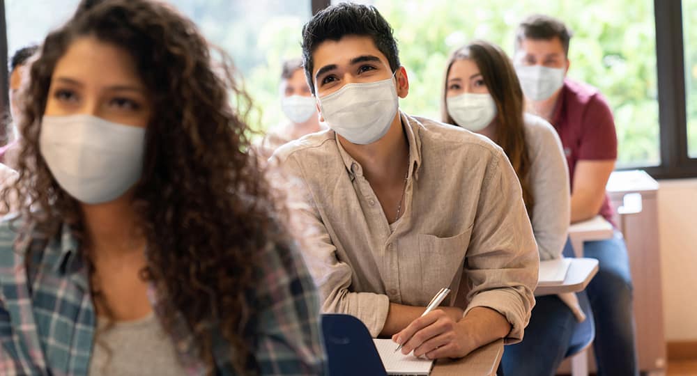 Masked students in classroom