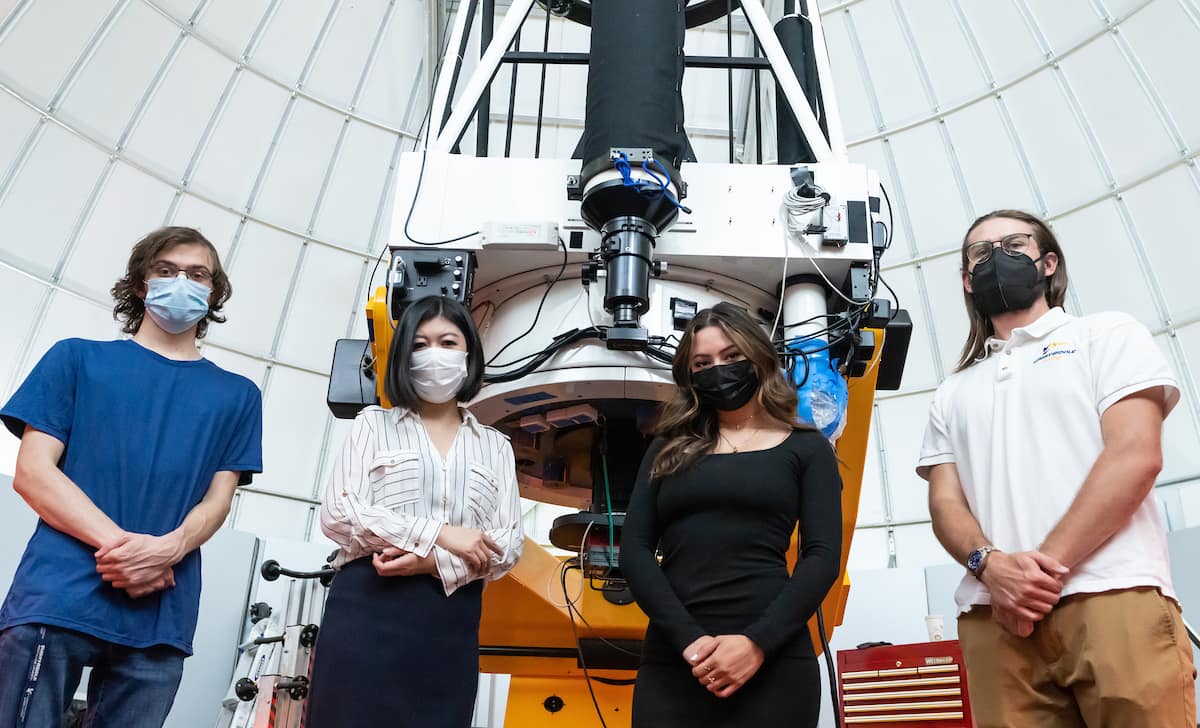 Assistant professor of Physics and Astronomy Dr. Tomomi Otani, along with students Jonathan Hodge, Lorena Sanabria and Brian Herbster, are researching mysterious stellar bodies using the one-meter telescope at Embry-Riddle’s Daytona Beach Campus, as part of a recently awarded National Science Foundation grant. (Photos: Embry-Riddle/Daryl LaBello)