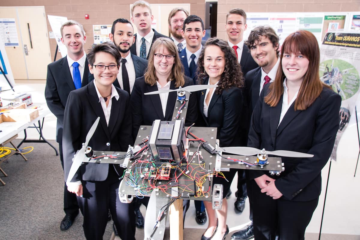 Students gathered around a group engineering project made in the College of Engineering at Embry-Riddle's Prescott campus