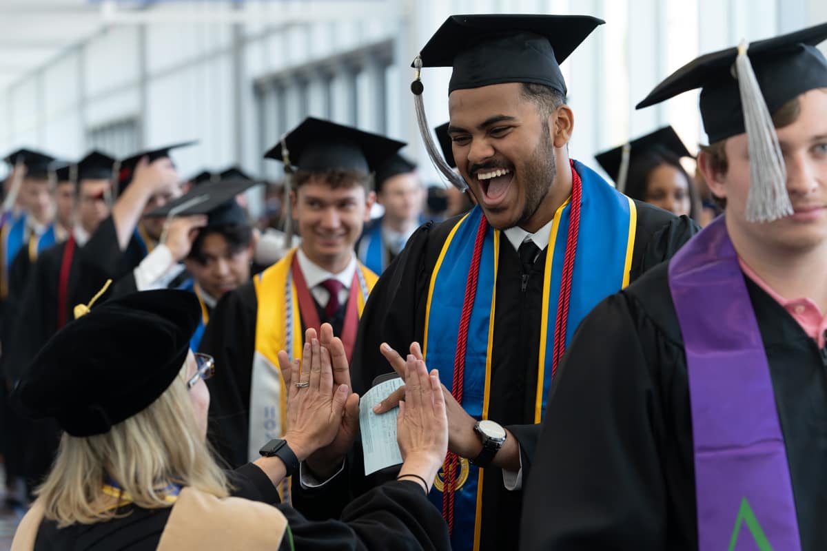 Students enter graduation ceremony